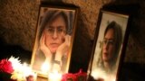 RUSSIA -- Flowers and candles lie on the Solovetsky Stone to mark the 13th anniversary of assassination of journalist Anna Politkovskaya, St. Petersburg, October 7, 2019