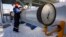 A Gazprom employee works at the Sudzha gas-measuring station, in Russia's Kursk region, just 200 meters from the Ukrainian border.