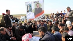 Janyna kast edilen syýasatçy Mohammed al-Jubouriniý jaýlanyş çäresi, Kirkuk, 2-nji dekabr, 2015