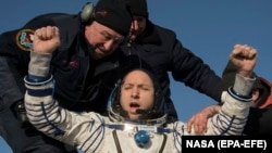 NASA astronaut Randy Bresnik is helped out of a Soyuz MS-05 spacecraft just minutes after it landed in a remote area near the town of Zhezkazgan, Kazakhstan, on December 14.