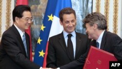 Chinese President Hu Jintao (left) is visiting France for three days