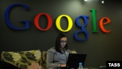 An employee works on a laptop at Google's headquarters in Moscow. (file photo)