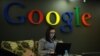 A woman works on a laptop at a Google facility in Moscow. (file photo)