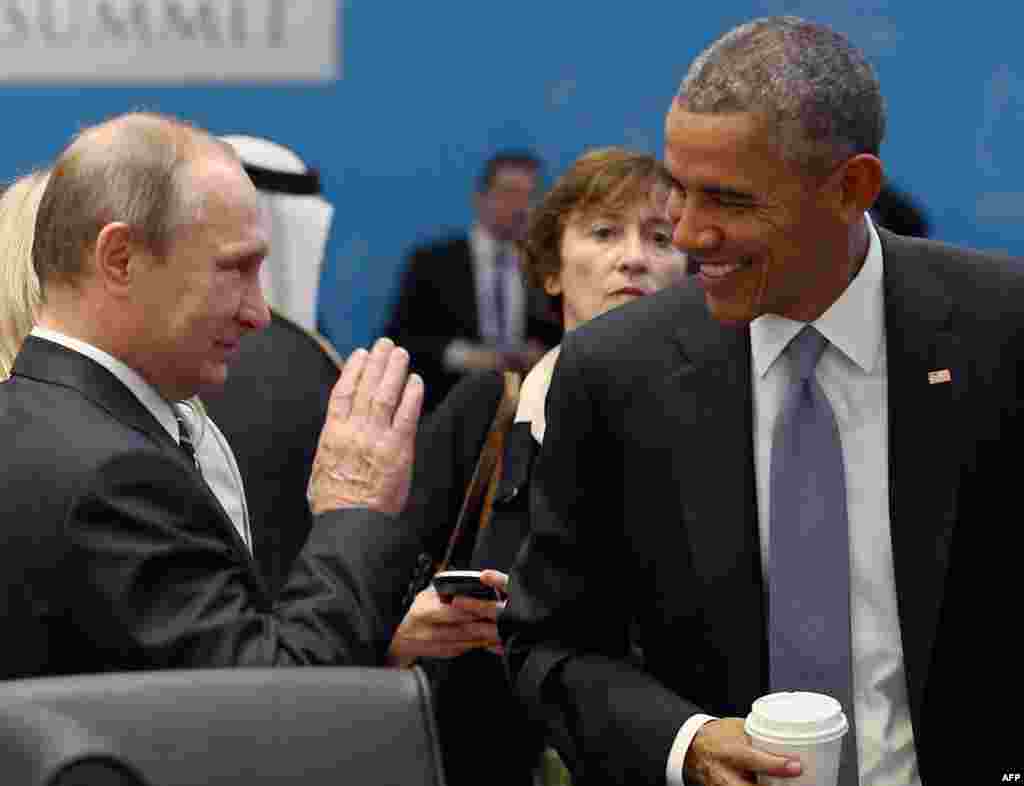 U.S. President Barack Obama (right) and Russian President Vladimir Putin talk before the second working session at the G20 summit in the Turkish Mediterranean resort of Antalya. (AFP/Kayhan Ozer)