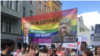 Russian authorities have long turned a blind eye to human rights abuses in the North Caucasus, where Chechen leader Ramzan Kadyrov (on banner, right) is frequently accused of overseeing massive human rights abuses including the persecution of LGBT people.