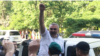 Afqan Muxtarli waves to supporters in Baku on May 30.