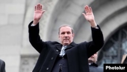 Opposition leader Levon Ter-Petrossian greets supporters rallying in Yerevan on March 1.