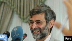 غلامحسين الهام که در دولت محمود احمدی نژاد چهار شغل اجرايی دارد، همزمان يکی از اعضای حقوقدان شورای نگهبان است. (عکس: فارس)