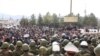 Riots began in the northwestern Kyrgyz city of Talas on April 6, as antigovernment protesters faced off with police.