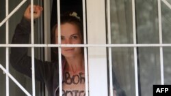 Аксана Шачко падчас судовага працэсу пасьля адной з акцый Femen