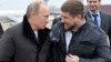 Vladimir Putin pictured with Ramzan Kadyrov in 2011.