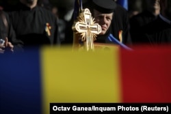 A Romanian nun takes part in a rally in support of a "yes" vote in the referendum in Draganesti on October 4.