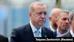 Turkish President Tayyip Erdogan arrives for the second day of a NATO summit in Brussels, Belgium, July 12, 2018