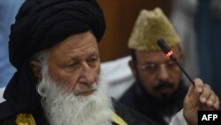 Council of Islamic Ideology (CII) Chairman Maulana Muhammad Khan Sherani addresses a press conference in Islamabad on May 26.