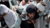 Toll From Pakistan Bombing Tops 100
