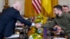 U.S. President Joe Biden shakes hands with Ukrainian President Volodymyr Zelenskiy in the East Room of the White House on September 21.