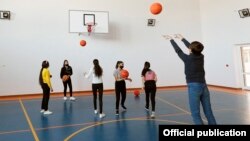 Armenia - Children play basketball at a school in the town of Gavar, March 9, 2021.