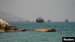 Vessels trickle through the Strait of Hormuz in early September.