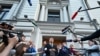 Yabloko party leader Nikolai Rybakov speaks to the media outside the Russian Supreme Court in Moscow on August 10, 2026.