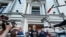Yabloko party leader Nikolai Rybakov speaks to the media outside the Russian Supreme Court in Moscow on August 10, 2026.