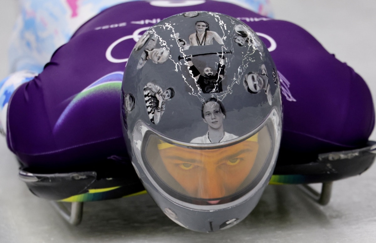 Ukrainian skeleton athlete Vladyslav Heraskevych trains at the 2026 Winter Olympics wearing a helmet dedicated to the memory of Ukrainian athletes killed in Russia's invasion of Ukraine.