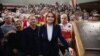 Belarusian opposition leader Svyatlana Tsikhanouskaya (center) poses for a photograph with the Belarusian diaspora in London on August 3.