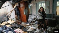 Донецкда вайрон этилган уйлардан бири.