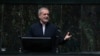 Iranian President Masud Pezeshkian speaks during a memorial at the parliament in Tehran, May 21