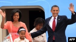 U.S. President Barack Obama, wife Michelle, and daughters Sasha and Malia arriving in Moscow on July 6.