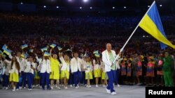 Микола Мільчев був прапороносцем під час церемонії відкриття Олімпіади в 2016 році