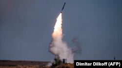 A rocket is launched from a S-400 missile system at the Ashuluk military base in southern Russia during the Caucasus-2020 military drills in September 2020.