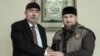 Afghan First Vice President Abdul Rashid Dostum (left) meets with Chechnya's Ramzan Kadyrov in Grozny on October 5.