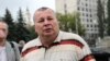 За наклейку "Я против Путина" задержан оппозиционер Кригер 