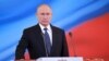 Vladimir Putin (center) is sworn as Russian president during a ceremony at the Kremlin in Moscow on May 7.