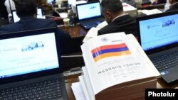 Armenia - A copy of the Armenian government's draft budget for 2017 seen during a parliament debate in Yerevan, 5Dec2016.