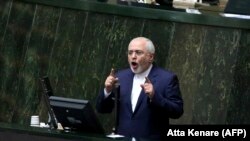 Iranian Foreign Minister Mohammad Javad Zarif delivers a speech in parliament over a bill to counter terrorist financing, October 7, 2018