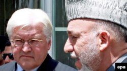 وزیر خارجهء جرمنی در جریان صحبت با حامد کرزی رییس جمهور افغانستان.