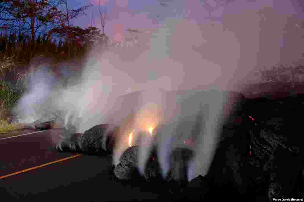 Volcanic gases rise from the Kilauea lava flow near Pahoa in Hawaii. (Reuters/Marco Gracia)