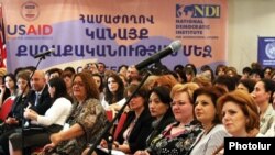 Armenia -- Culture Minister Hasmik Poghosian (R) participates in a conference on women's role in Armenian politics, 18May2011.