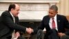 ABŞ-nyň prezidenti B.Obama (s) we Yragyň premýer-ministri N.al-Maliki (ç) Waşington, 2013. 
