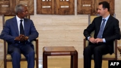 Syria -- President Bashar al-Assad meets with UN-Arab League envoy Kofi Annan (L) in Damascus, 09Jul2012