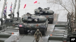 Польські та інші війська НАТО беруть участь у військових маневрах Steadfast Defender 24 у Корженево, Польща, 4 березня 2024 року
