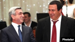 Armenia - President Serzh Sarkisian (L) and Prosperous Armenia Party leader Gagik Tsarukian attend an official celebration in Yerevan.