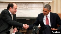 Премьер-министр Ирака Нури аль-Малики (слева) и президент США Барак Обама. 