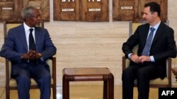 Syria -- President Bashar al-Assad meets with UN-Arab League envoy Kofi Annan (L) in Damascus, 09Jul2012