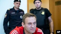 Alexei Navalnîi, opozantul rus, înaintea unui apariții într-un tribunal din Moscova, 22 august 2019