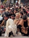 Displaced From Pakistan's Tirah Valley, Evacuees Seek Aid In Peshawar
