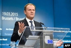 EU Council President Donald Tusk speaks during a press conference during an EU Council summit at EU headquarters in Brussels on March 19.