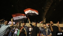 Supporters of cleric Muqtada al-Sadr gather in after breaking into Baghdad's heavily fortified Green Zone.