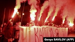 Во время протеста против подписания в Минске так называемой «формулы Штайнмайера» у Офиса президента Украины. Киев, 1 октября 2019 г.